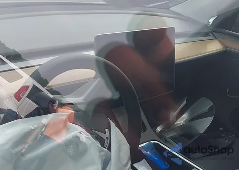 2024 Tesla Model Y from USA, damaged, VIN 7SAYGDEE3RA262510